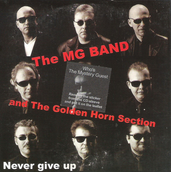 The MG Band – Never Give Up (2002) – Hoes